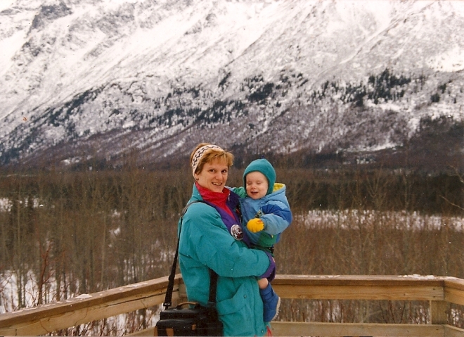 Mom in Alaska with a baby brother